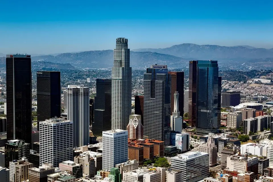Downtown Los Angeles from the air, the mountains behind